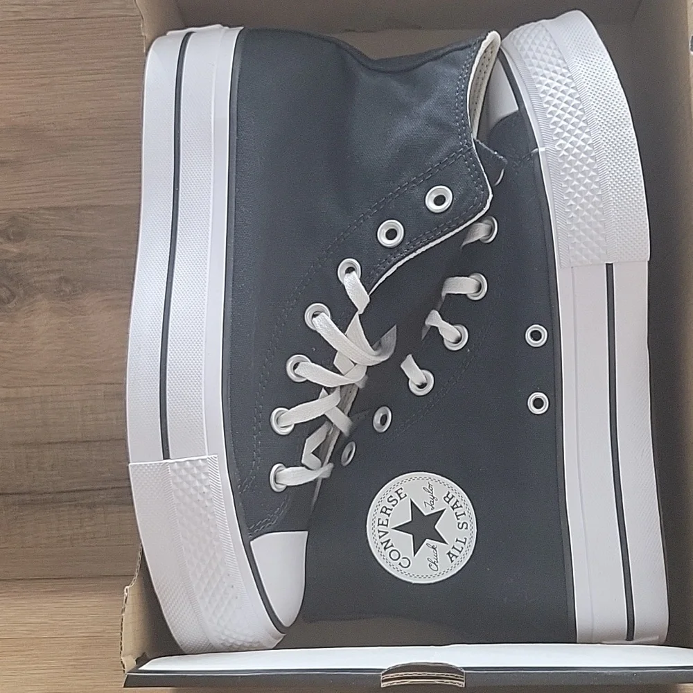 Converse Black and White Chuck Taylor High-Tops